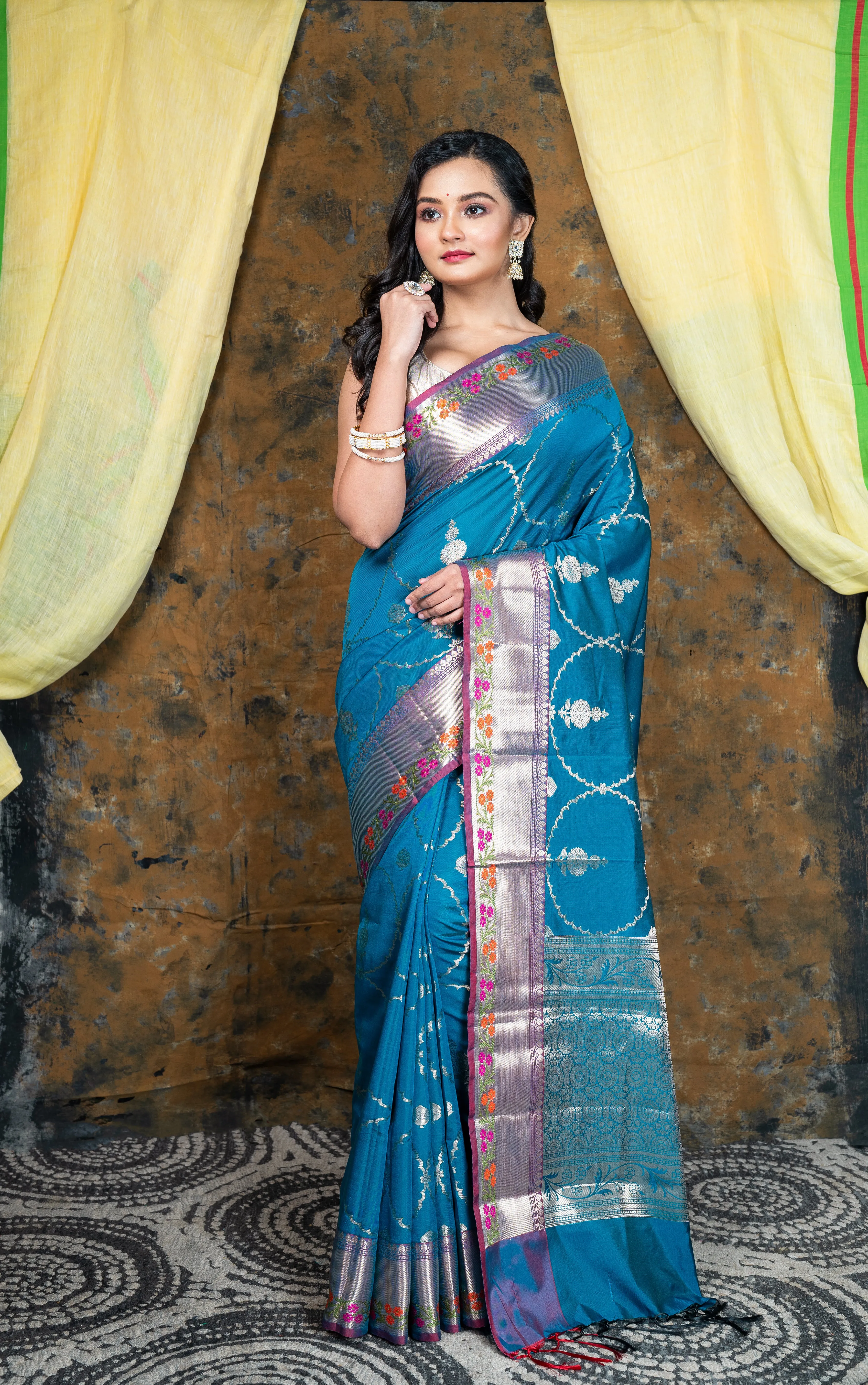 Women Cerulean Soft Banarasi Uppada  Silk Saree With Golden Woven Motifs