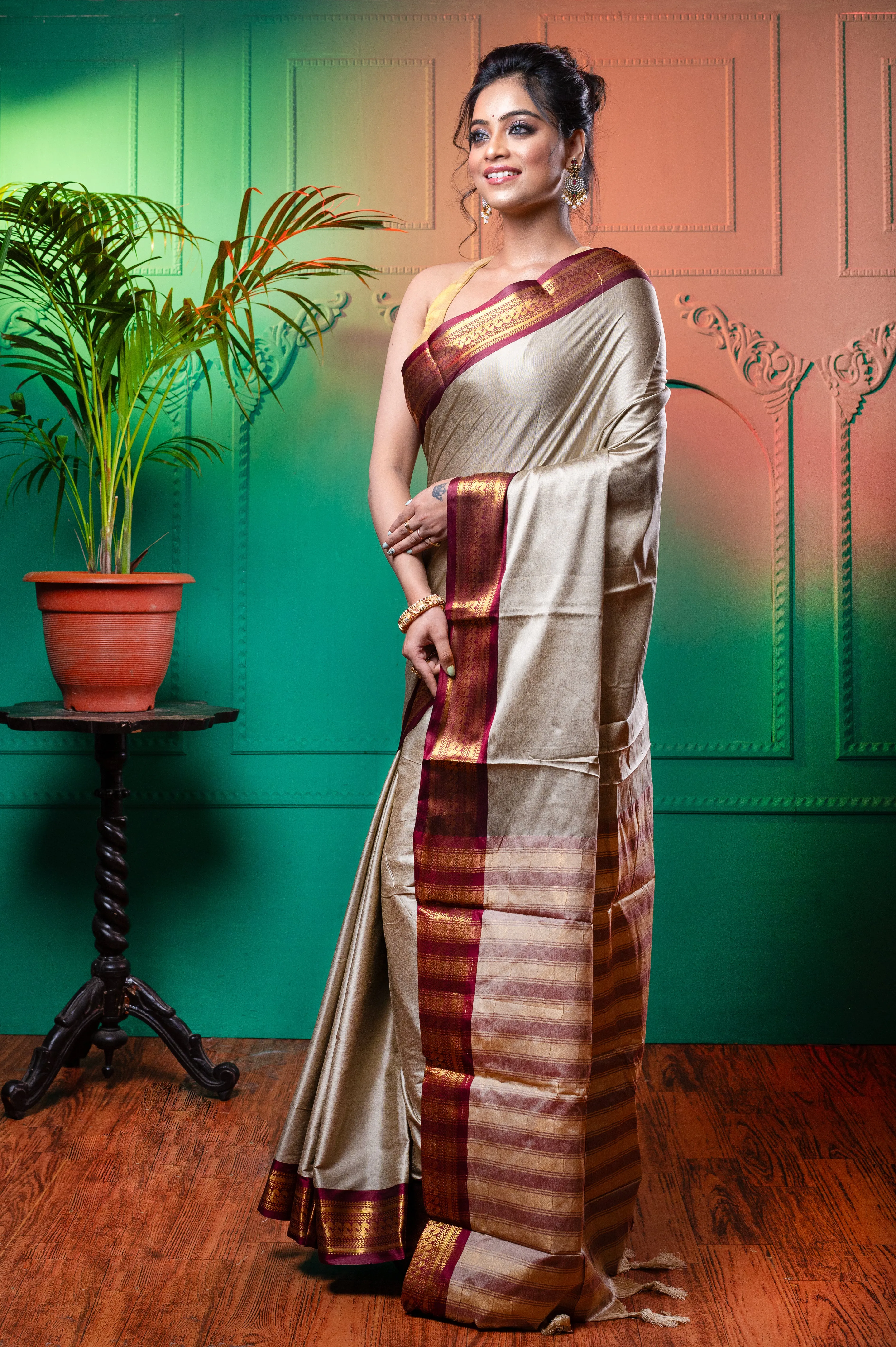 Women Grey Aura Silk Saree With Contrasting Magenta And Golden Zari Border