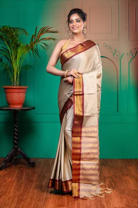 Women Grey Aura Silk Saree With Contrasting Magenta And Golden Zari Border