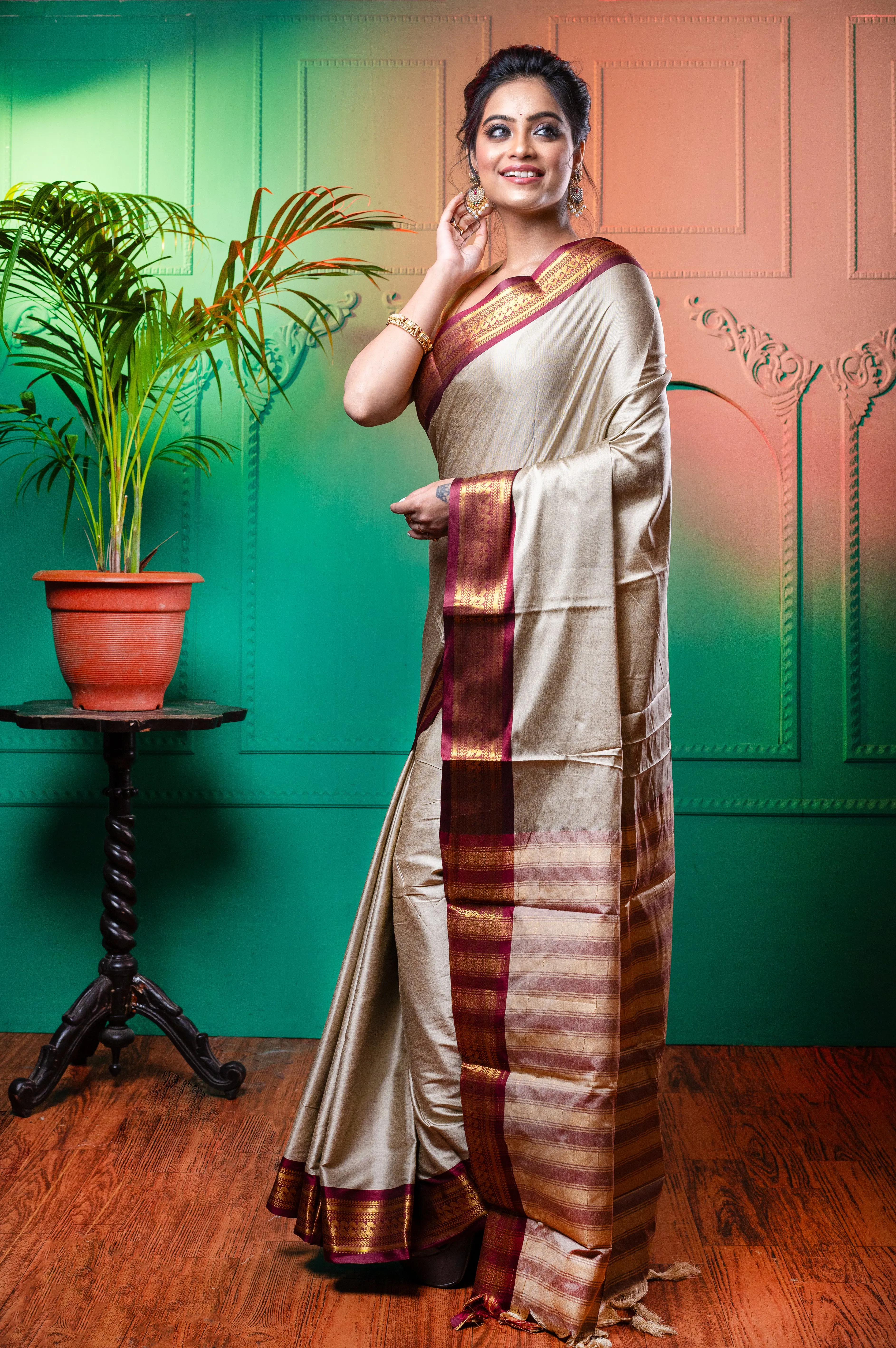 Women Grey Aura Silk Saree With Contrasting Magenta And Golden Zari Border