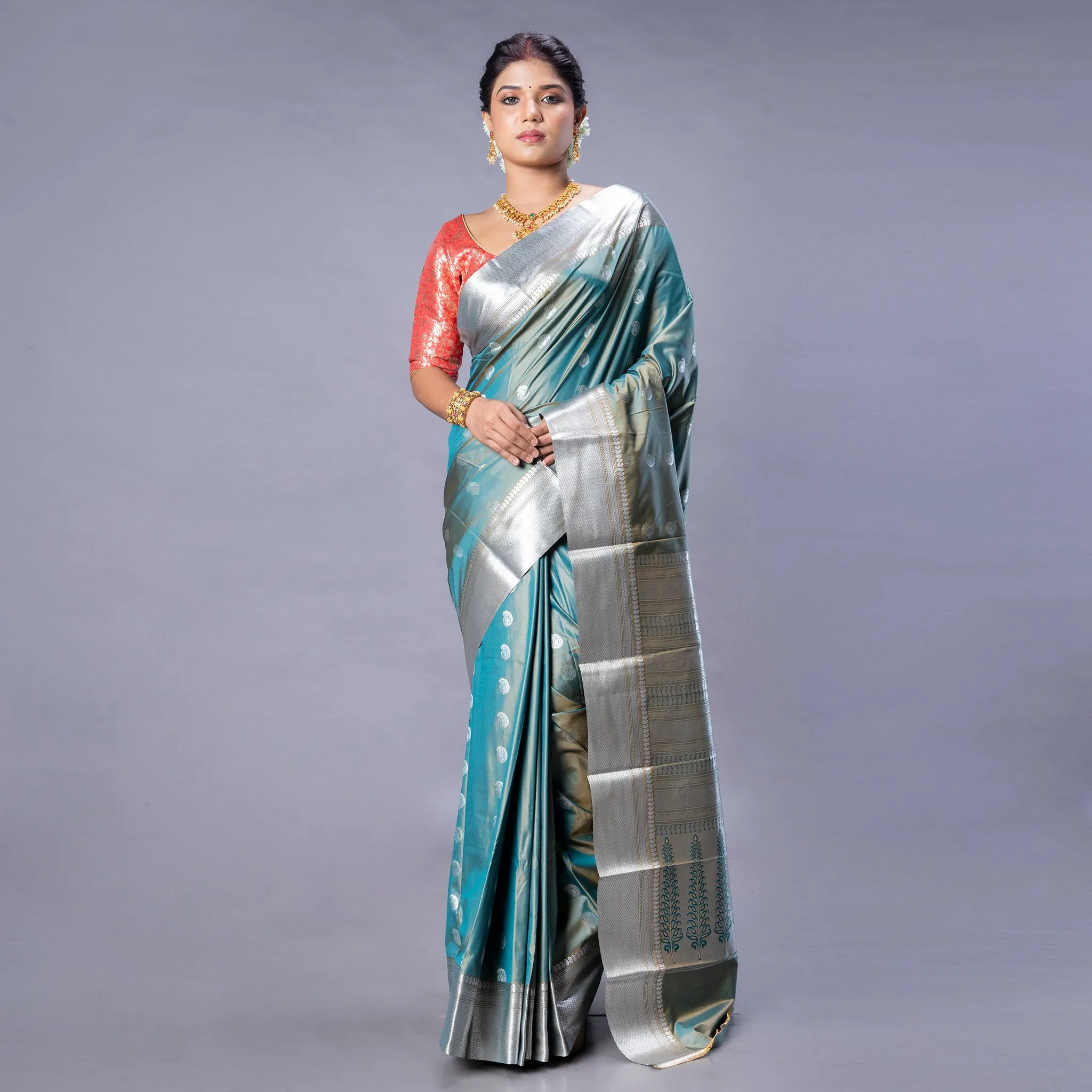 Women Kanjivaram Saree In Blue Color With Silver And Copper Zari Border