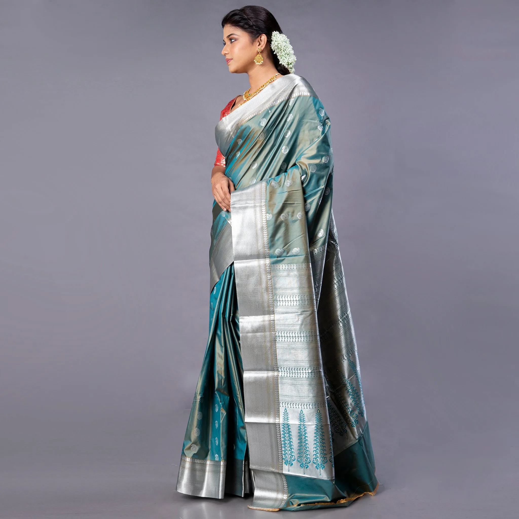 Women Kanjivaram Saree In Blue Color With Silver And Copper Zari Border