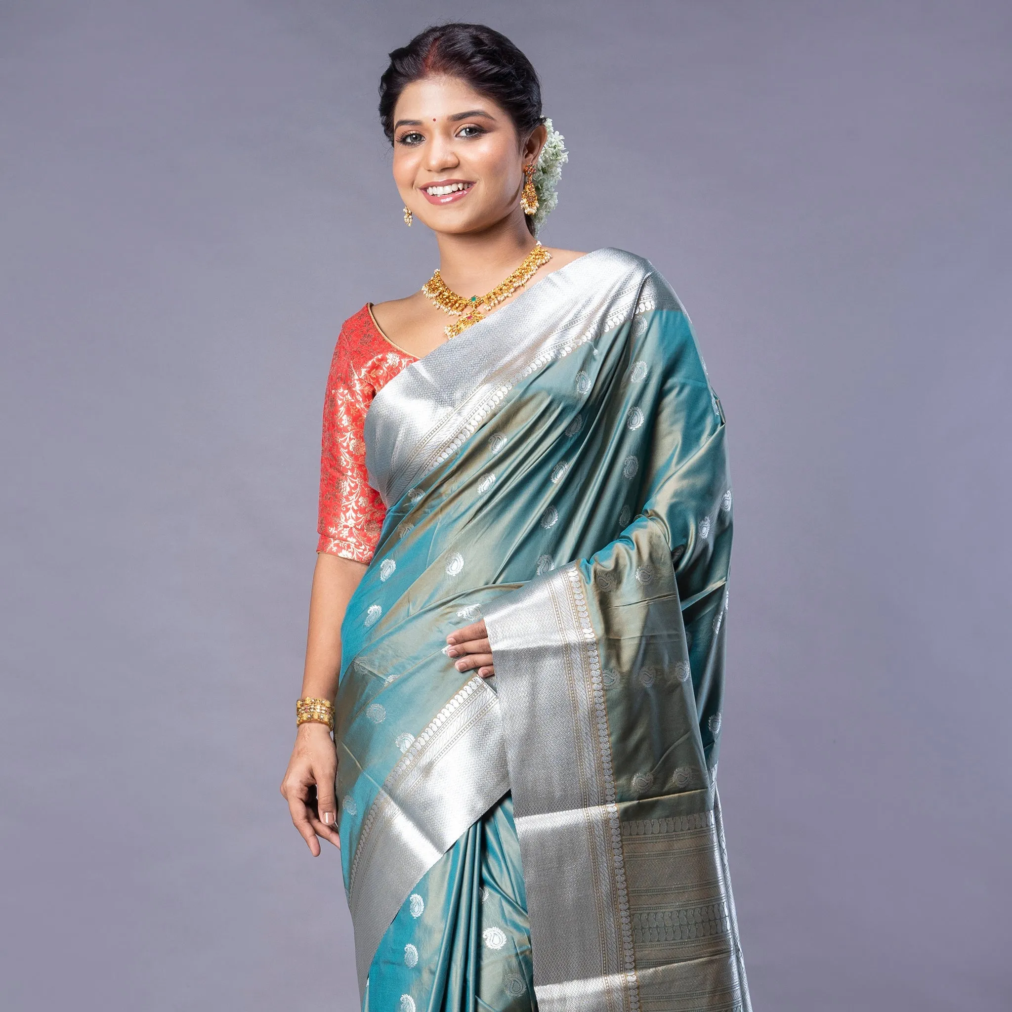 Women Kanjivaram Saree In Blue Color With Silver And Copper Zari Border