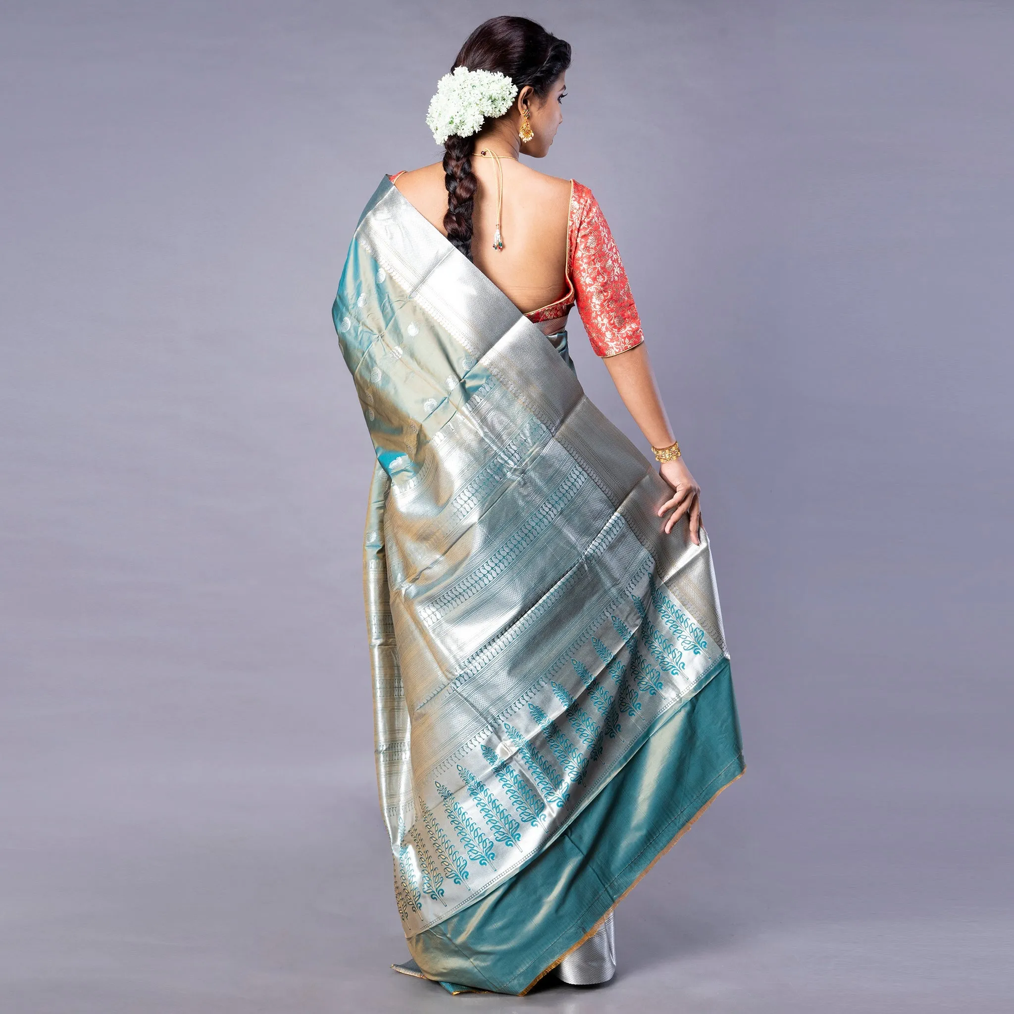 Women Kanjivaram Saree In Blue Color With Silver And Copper Zari Border